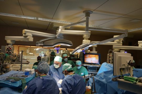 Surgeons practicing robotic-assisted techniques